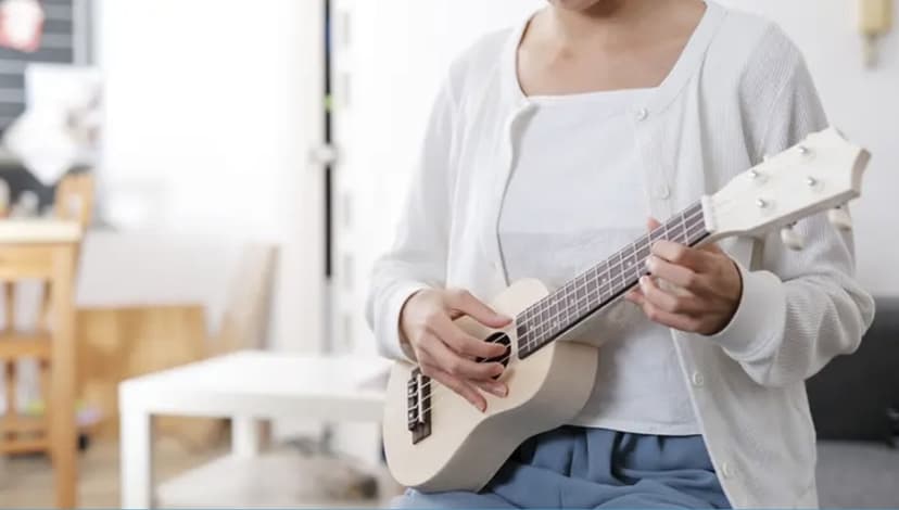Ukulelės pamokos muzikos studijoje „Visos Stygos“